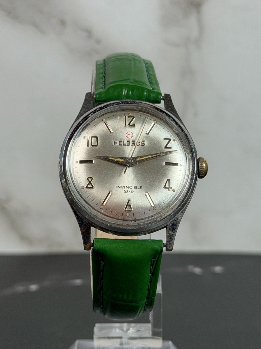 Vintage Helbros Invincible Manual Wind Watch Swiss Made Silver Dial Green Strap